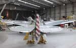 G-CIIO @ EGSU - Curtiss P-40C Warhawk undergoing maintenance at the IWM and other collections, Duxford - by Ingo Warnecke