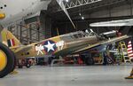 G-CGZP @ EGSU - Curtiss P-40F Warhawk undergoing maintenance at the IWM and other collections, Duxford - by Ingo Warnecke