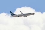 C-FWVJ @ KORD - B738 WestJet Boeing 737-8CT, C-FWVJ Departing KPSP - by Mark Kalfas
