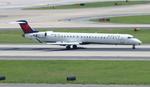 N802SK @ KATL - SKW/DAL CR9 zx evv-atl - by FloridaMetal