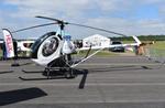 G-CEBE @ EGTB - Schweizer 269C-1 at Wycombe Air Park.  - by moxy