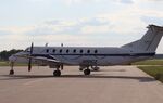 N191CZ @ KMLI - Beech 1900C - by Mark Pasqualino