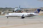 N906EV @ KORD - CL-600-2B19 - by Mark Pasqualino