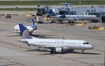 N648RW @ KORD - ERJ-170-100SE - by Mark Pasqualino