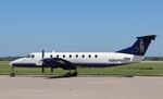 N390PM @ KMLI - Beech 1900C-1