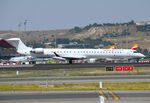 EC-LOJ @ LEMD - Air Nosrtum CL1000 operating for Iberia Regional - by FerryPNL