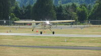 N4116N @ S43 - Takeoff roll 33R Harvey Field - by Mark R Peterson
