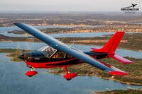 N3272T - Red Tag Art's Cardinal over Texas - by Eric Johnson