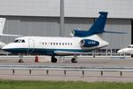 LX-GLD @ LOWW - Untiled Falcon 900 - by Andy Graf