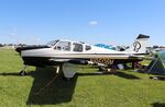 N8608M @ KOSH - Beech B33 - by Mark Pasqualino