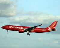 OY-GKN @ EKCH - OY-GKN landing rw 04L - by Erik Oxtorp