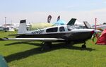 N9149P @ KOSH - Mooney M20M - by Mark Pasqualino