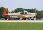 N7411V @ KOSH - Mooney M20F - by Mark Pasqualino