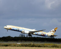 A6-BMA @ EKCH - A6-BMA taking off rw 22R - by Erik Oxtorp