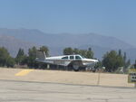 N2128D @ POC - Taxiing to runway 26L - by Helicopterfriend