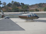 N764CL @ POC - Parked at a hanger - by Helicopterfriend