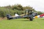 G-AGHY @ EGTH - G-AGHY 1939 DH82A Tiger Moth DH60 Centenary Fly In Old Warden - by PhilR