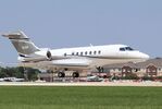 N2RF @ KOSH - Cessna 700 Latitude - by Mark Pasqualino