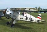 D-EAUU @ EDOI - Bücker (Doflug) Bü 133C Jungmeister at Bienenfarm airfield during the 2025 Quax Bücker-Treffen (Bücker-Meeting) and Vintage Aerobatic World Championships - by Ingo Warnecke