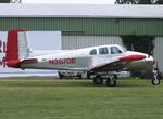 N3670B @ EDOI - Beechcraft B50 Twin Bonanza at Bienenfarm airfield during the 2025 Quax Bücker-Treffen (Bücker-Meeting) and Vintage Aerobatic World Championships - by Ingo Warnecke