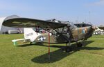 N68591 @ KOSH - Stinson L-5 - by Mark Pasqualino