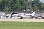 N75CL @ KOSH - Beech 58 - by Mark Pasqualino