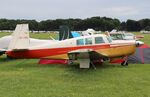 CF-YEL @ KOSH - Mooney M20G - by Mark Pasqualino