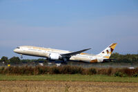 A6-BLS @ EKCH - A6-BLS taking off rw 22R - by Erik Oxtorp