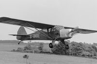 G-AHXE - Landing at Essex & Suffolk Gliding site at Whatfield, Suffolk - by John Bradley