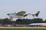 N82MG @ KOSH - Cessna T337B
