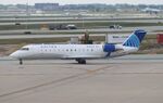N906EV @ KORD - CL-600-2B19 - by Mark Pasqualino