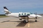N303DK @ GCM - Cessna T303 - by Mark Pasqualino