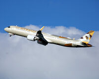 A6-LRE @ EKCH - A6-LRE takeoff rw 22R - by Erik Oxtorp