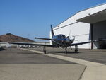 N900SG @ POC - Parked by hangers - by Helicopterfriend