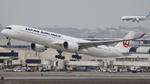  @ KLAX - JAL A35K w/ ANA 789 landing in background - by AviationLover50