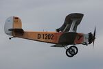D-EOSM @ EDMT - Udet Flamingo Replica in flight at Tannkosh 2013. The next day it had an accident at this location.
