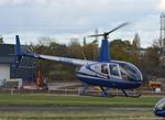 G-SIRD @ EGTR - Robinson R44 Raven II at Elstree. - by moxy