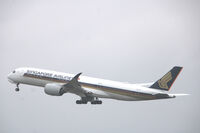 9V-SMK @ EKCH - 9V-SMK taking off rw 22R - by Erik Oxtorp