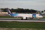  @ LMML - Embraer E195-AR reg 40-AOE of Air Montenegro on the main runway in Malta after landing on RW13. - by raymond