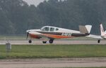 N489E @ KOSH - Beech A35 - by Mark Pasqualino