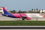 9H-WDA @ LMML - Airbus A320-232 reg 9H-WDA of Wizzair Malta taxiing out from Park No9 at Malta for departure. - by raymond