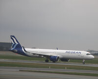 SX-NAJ @ EKCH - SX-NAJ taking off rw 22R - by Erik Oxtorp