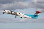 LX-LGN @ LMML - De Havilland Canada DHC-8-402Q reg LX-LGN in special livery for Luxair taking off from Malta after receiving maintenance at Med Avia Malta. - by raymond