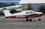 N7300J @ PAAQ - Cherokee N7300J in front of DC-3 N763A at Palmer Municipal