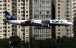 PR-AXB @ SBRJ - Rios Pao de Acucar offers nice views to aircraft on final for Santos Dumont RW02, as seen with this Azul Embraer with Coca Cola Zero advertising - by Reinhard Jost