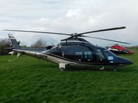 G-ISPM @ EGBC - At Cheltenham Helipad for the Gold Cup - by James Lloyds