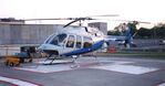 N407AM @ KSTJ - On the helipad - by Floyd Taber