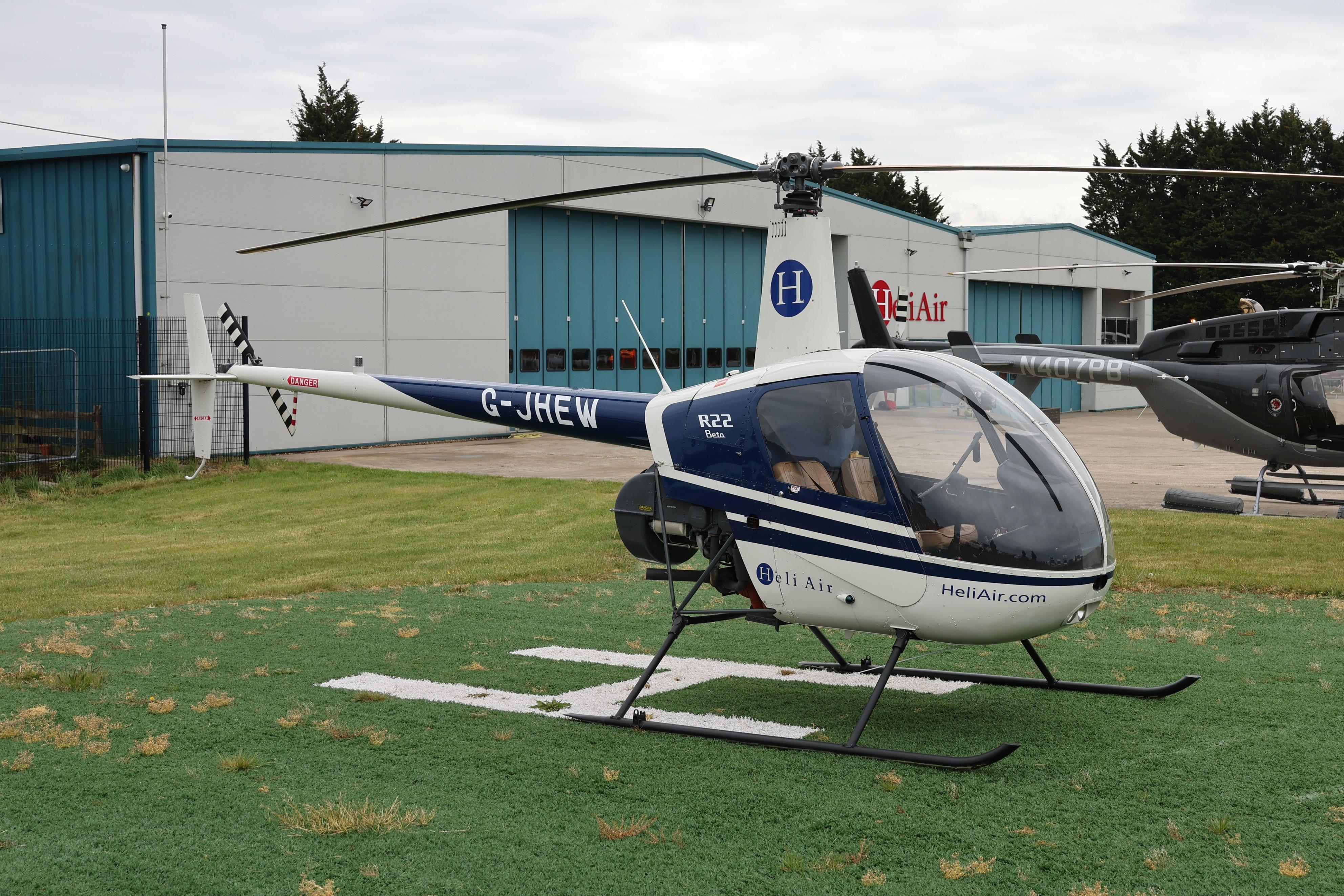 G-JHEW @ EGTB - G-JHEW 1987 Robinson R22 Beta Private Flyer Fest Booker 
 - by PhilR