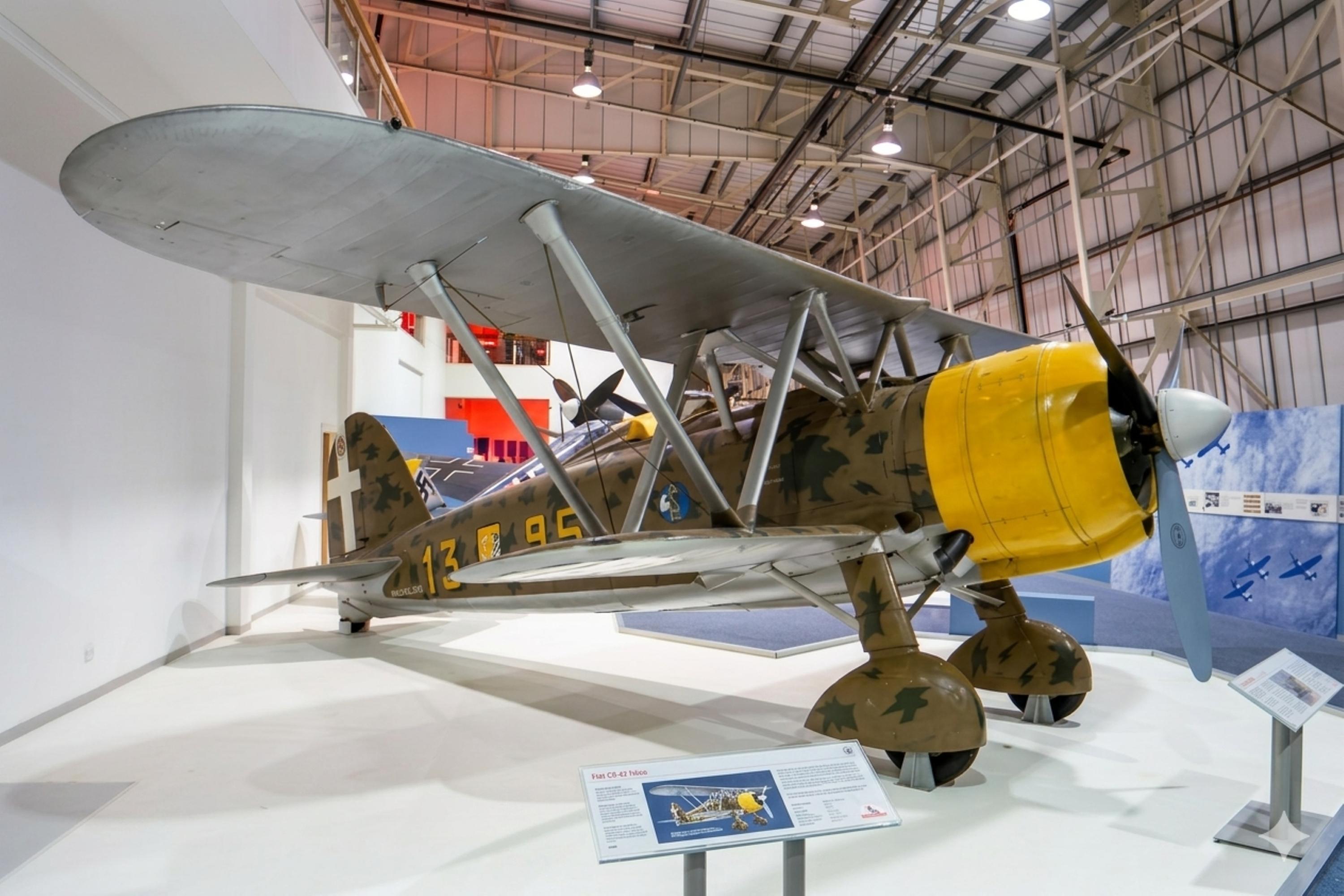 MM5701 @ HENDON - MM5701 1940 Fiat CR42 Falco ItalianAF RAF Museum Hendon
 - by PhilR