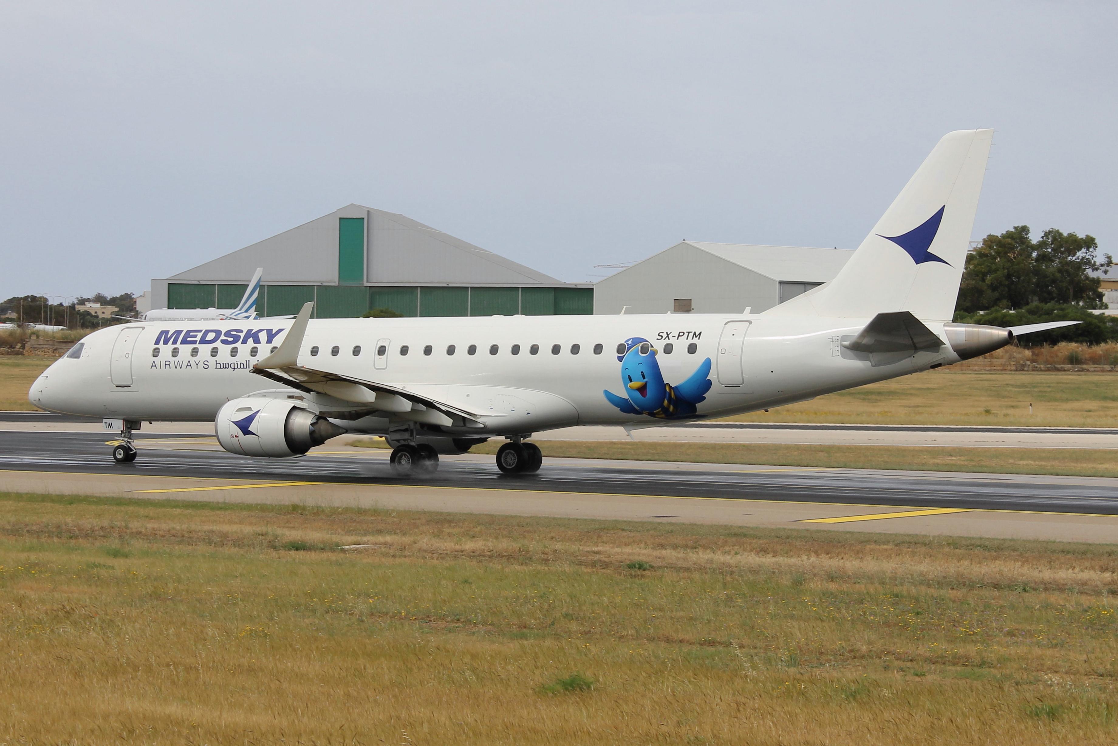 SX-PTM @ LMML - Embraer 190SR reg SX-PTM of Medsky taxiing out for departure to Mitiga, Libya. - by raymond
